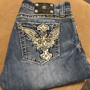 Miss Me distressed skinny jeans tag size 32.